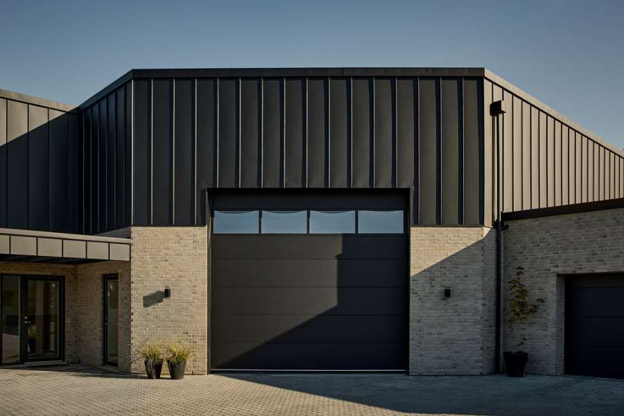 Stylish steel profiles on the façade of a newly built house with space for everything, Navervænget 9, 6710 Esbjerg, Denmark